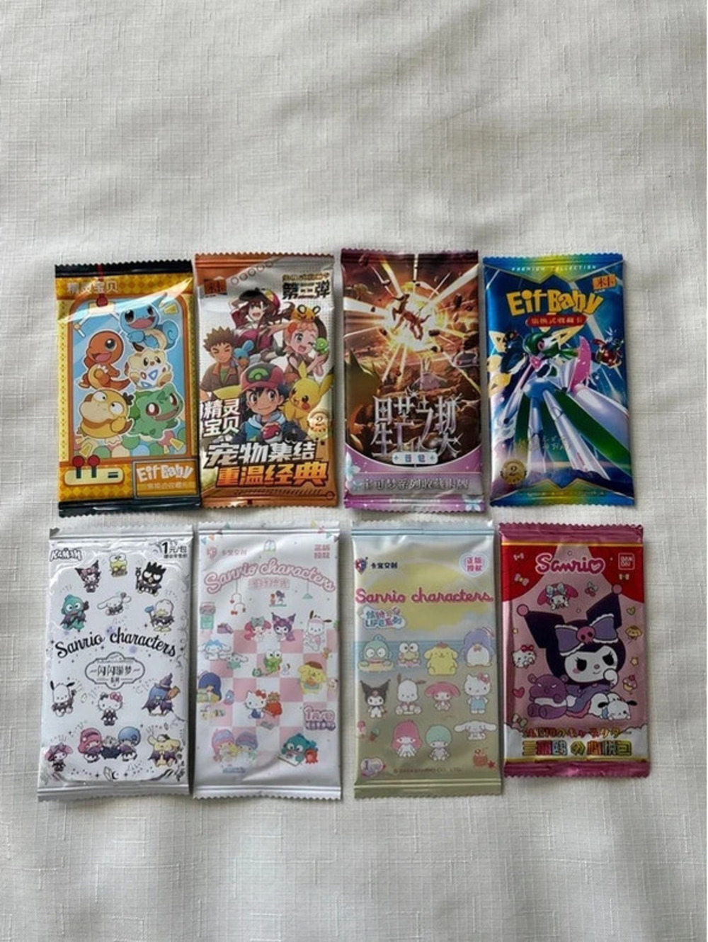 Pokemon & Sanrio Booster Packs - 8 packs / 26 cards